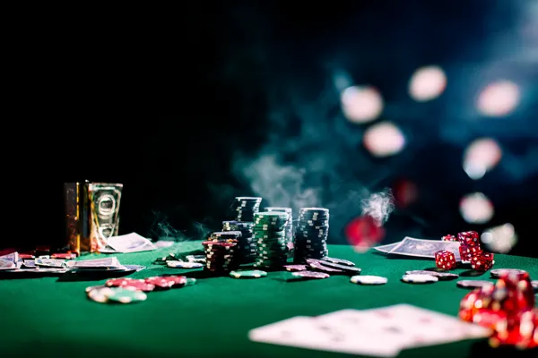 A close-up shot of golden coins falling around a spinning roulette wheel, representing immersive casino action at CD444.
